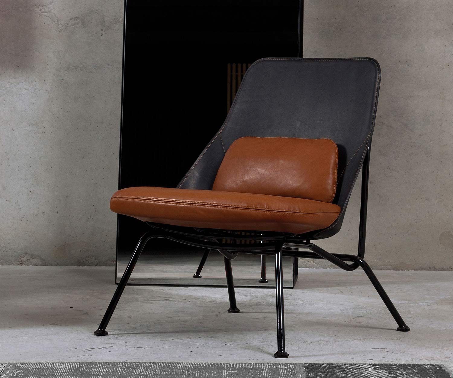 Prostoria Design Sessel Strain mit Sitzfläche in Leder Cognac