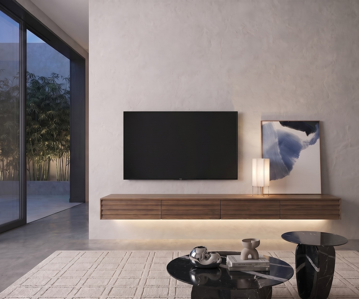 Hängendes TV Lowboard Punt Sussex Konfigurator aus Nussbaum im modernen Wohnzimmer mit LED-Beleuchtung und Marmortisch.