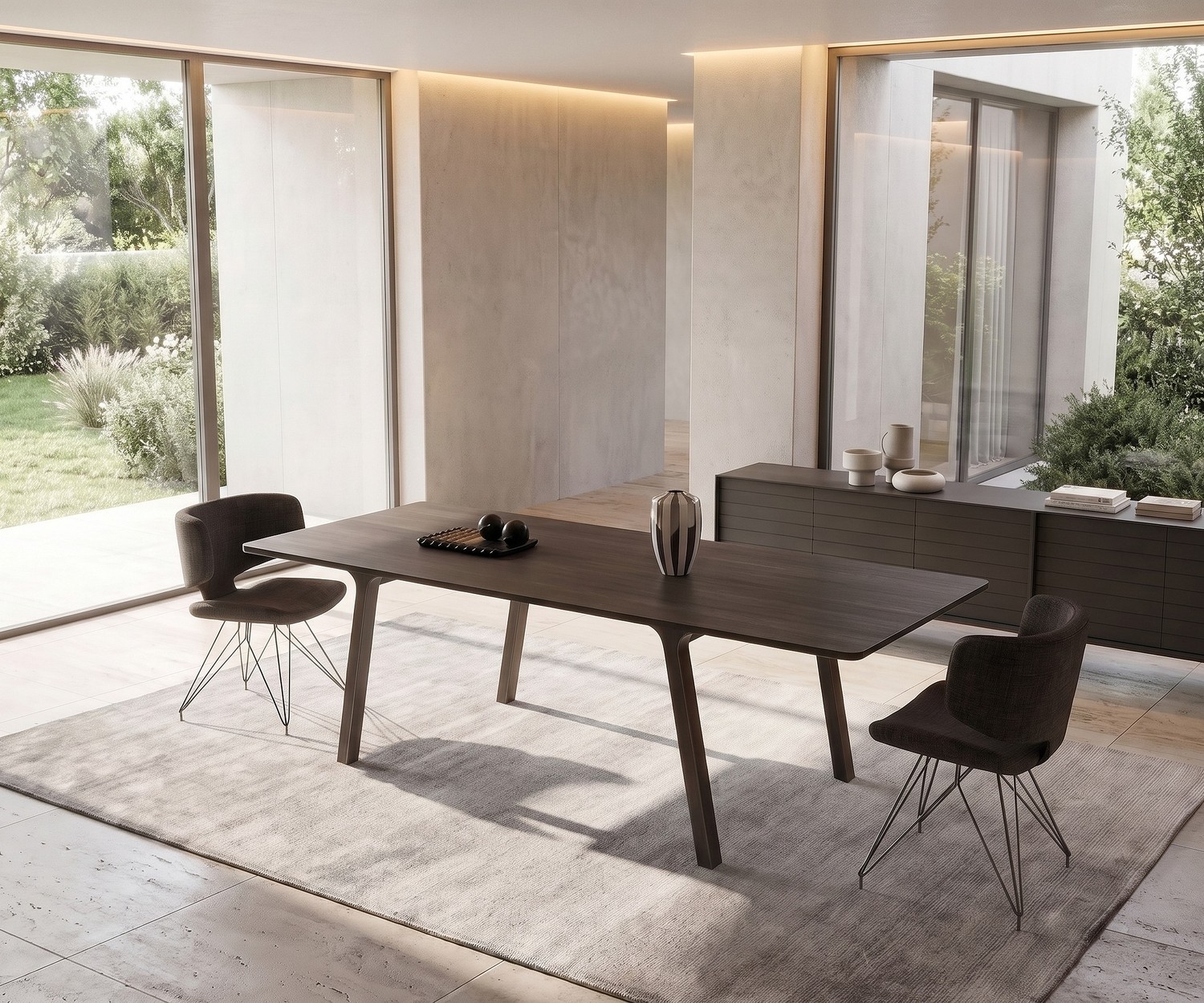 Design Esstisch mobius 001 von al2 für das Esszimmer aus dunklem Holz, auf Teppich in modernem, lichtdurchflutetem Raum.