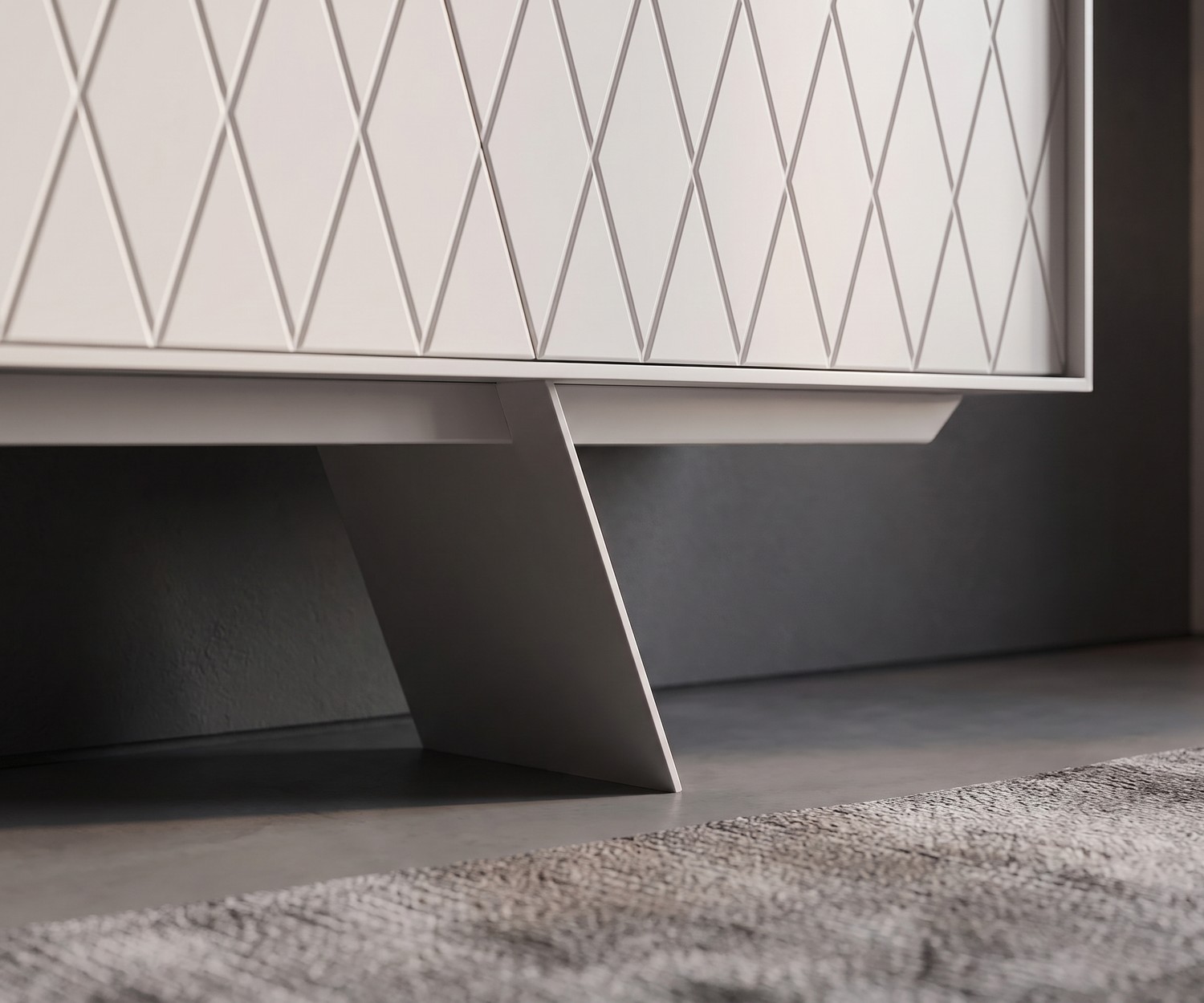 al2 e-klipse 003 Sideboard im Wohnzimmer mit weißem Rautenmuster und eleganten, schrägen Standfüßen im modernen Design.