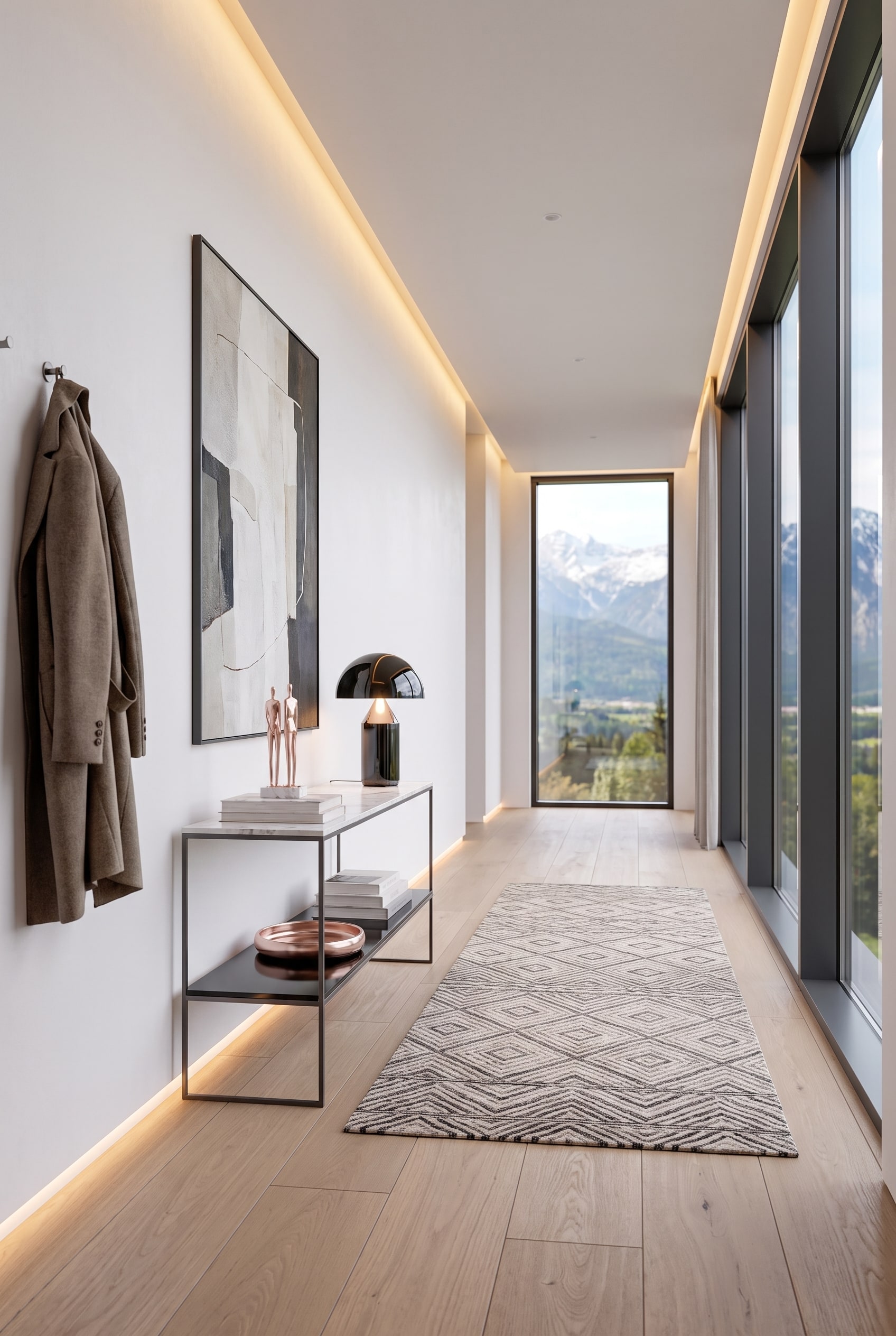 Modernes Entr&eacute;e mit Konsole aus dunklem Metall und Marmorplatte, darauf eine skulpturale Leuchte, mit gro&szlig;en Fenstern im Hintergrund