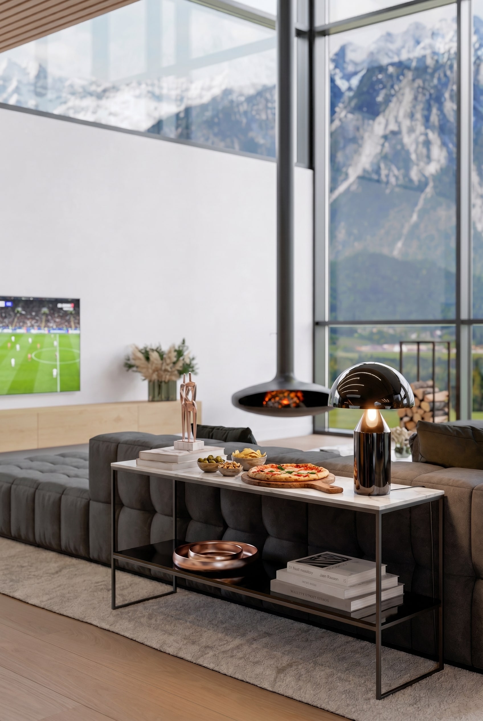 Schmale schwarze Konsole platziert hinter einem freistehenden Sofa in einem luxuriösen Wohnbereich, darauf gestapelte Bildbände und eine edle Tischlampe