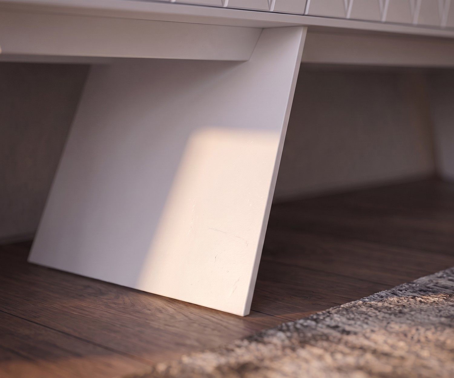 Fuß des Designer Lowboards e-klipse 008 von al2, detailreiche Nahaufnahme der eleganten weißen Standfüße aus Holz.